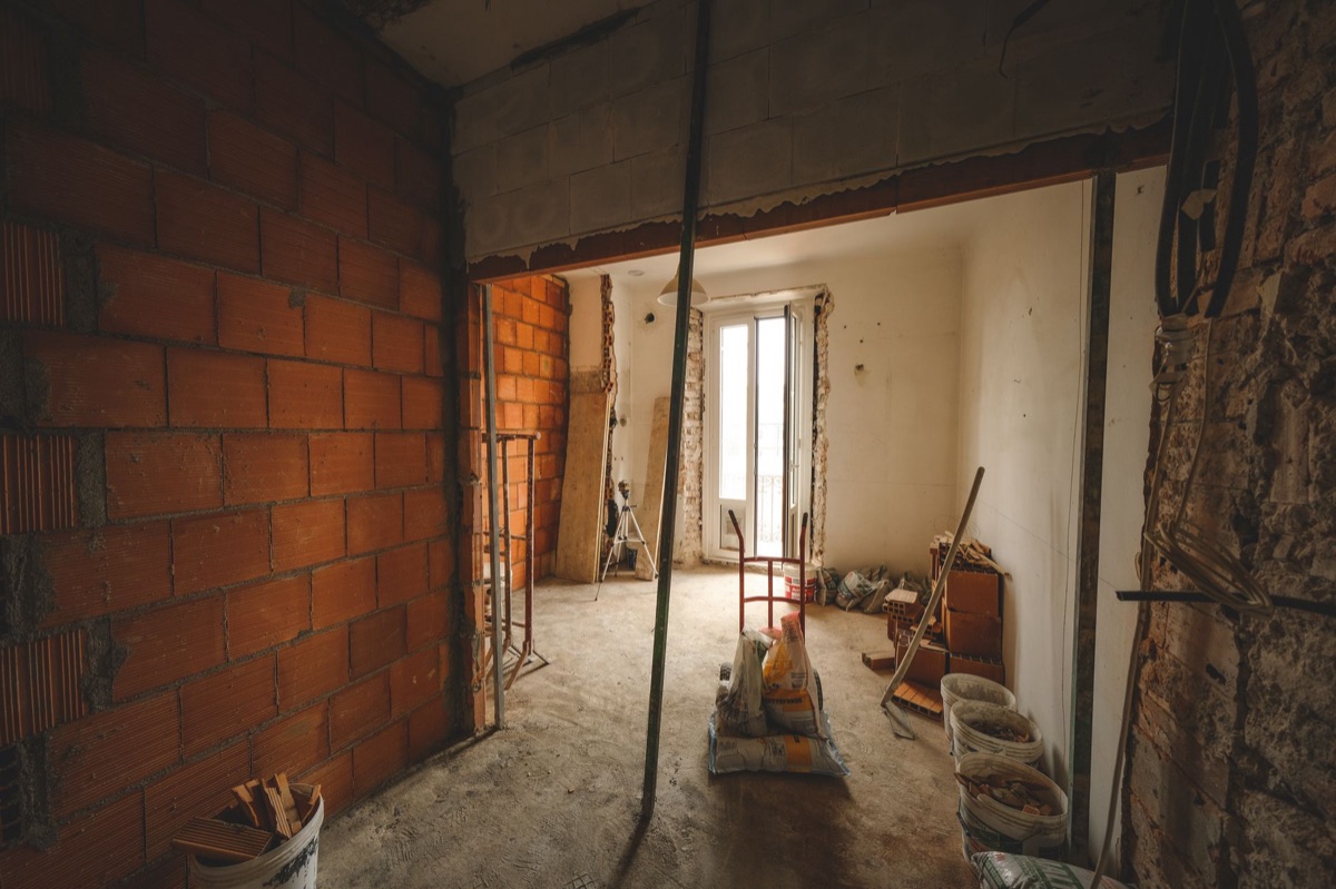 A home renovation in progress with debris and materials to haul away